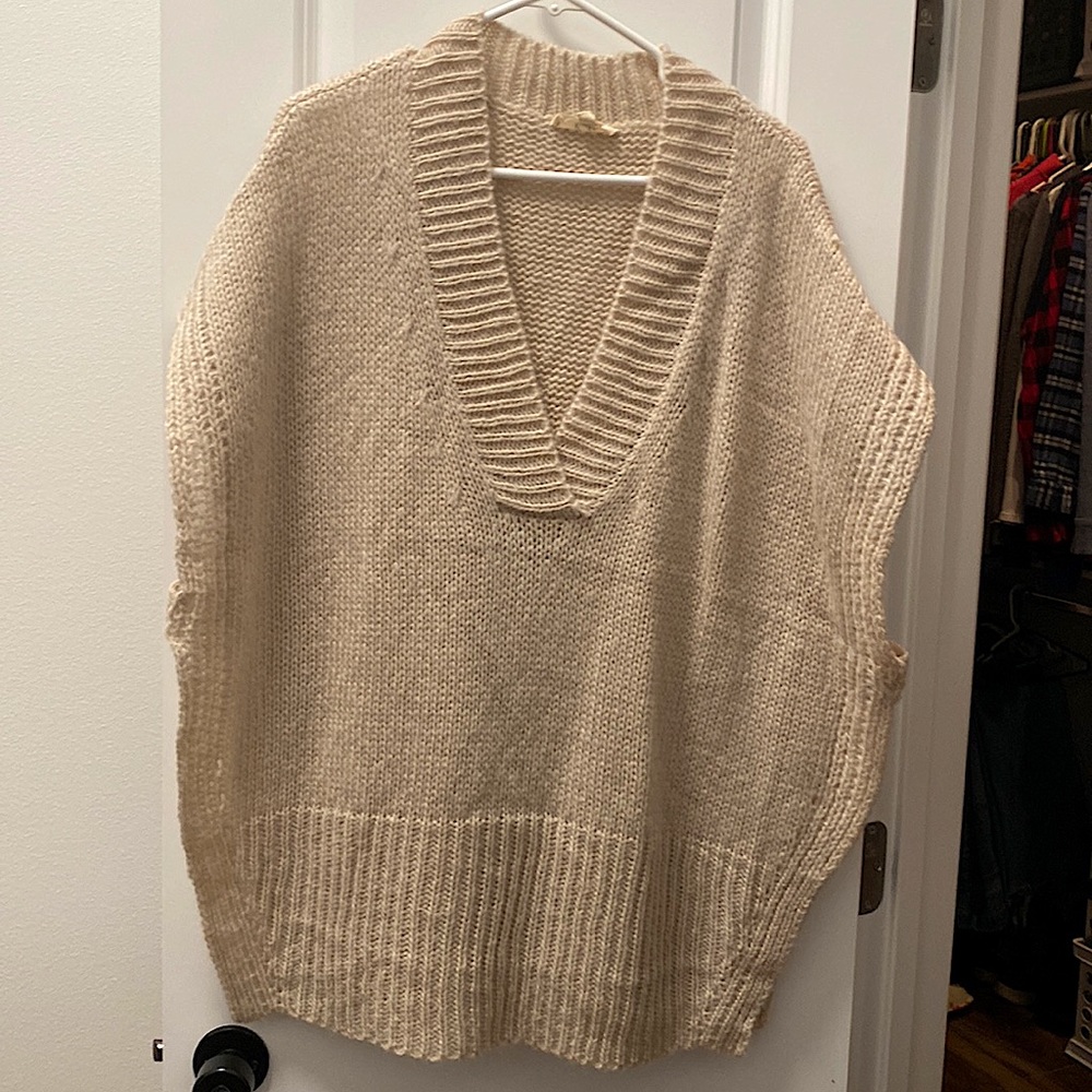 Knitted poncho sweater